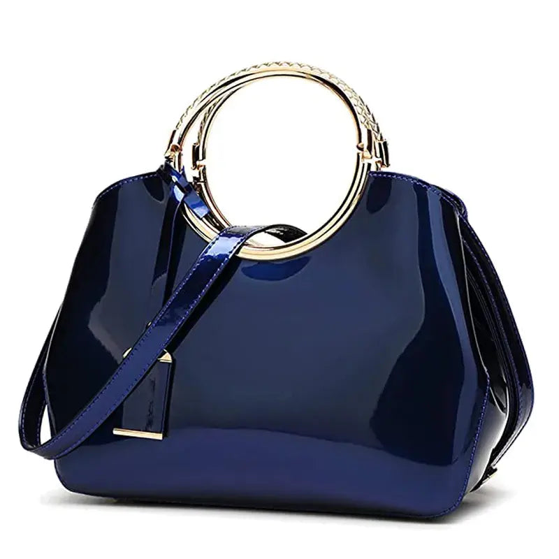 Royal Blue Gloss Curved Handbag with Woven Metal Ring Handle & Removable Crossbody Strap